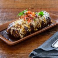 Burrito · Choice of protein or mixed vegetables,  rice, beans, cheese, pico de gallo, crema, avocado s...
