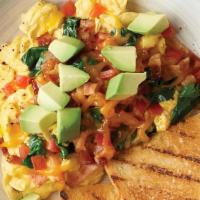 Bacon Avocado Egg Bowl · fluffy scrambled eggs topped with diced tomato, chopped baby spinach, Applewood smoked bacon...