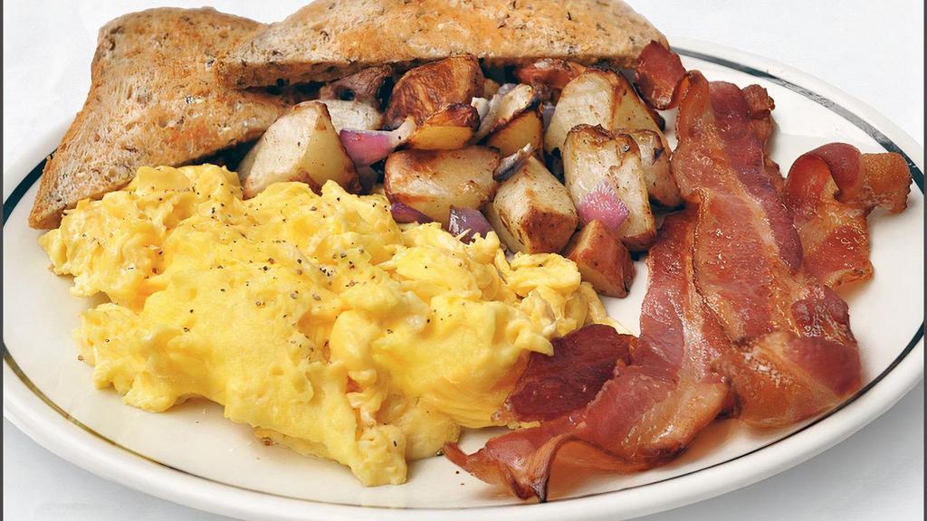 All American Scrambler · scrambled eggs with a side of bacon