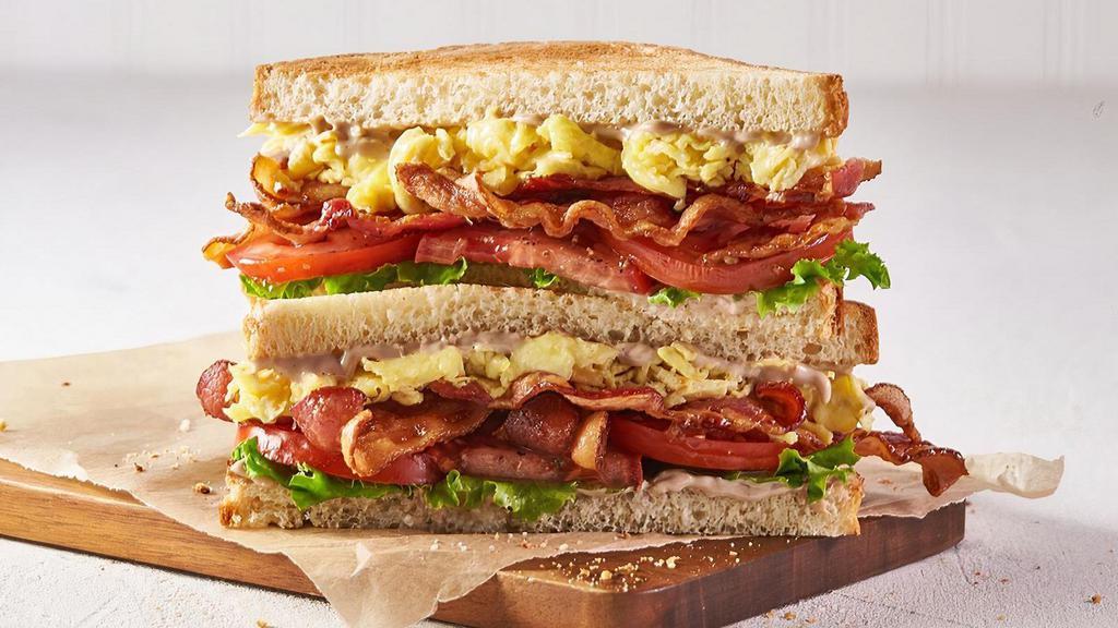 BBLT & Egg Sandwich · scrambled eggs, bacon, tomato, lettuce, black pepper balsamic aioli, white toast