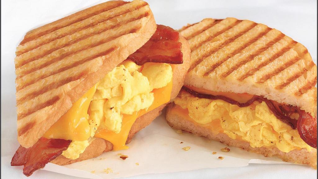 Bacon & Cheddar Panini · scrambled eggs, bacon, cheddar, grilled sourdough