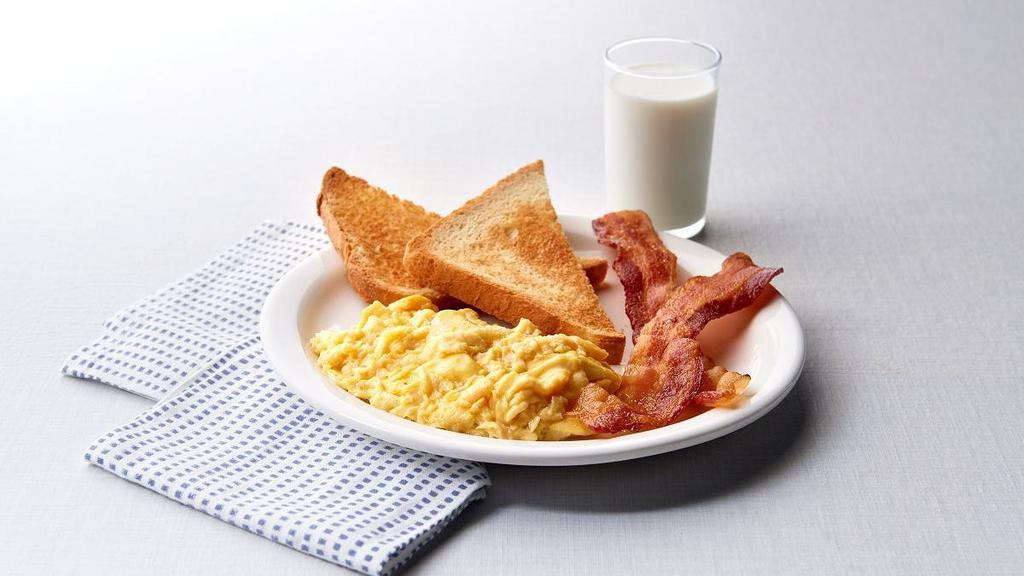 Kids Breakfast · Choose from scrambled eggs or pancakes.  Served with bacon or fresh fruit and milk or kids' juice.