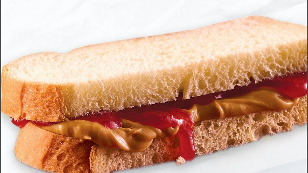 Kids Sandwich · Choice of Turkey, Ham, Grilled Cheese or PB&J on either white or harvest bread with a pickle and bakery chips or baby carrots.  Served with your choice of fresh fruit or a freshly baked cookie and milk, 12 oz soft drink, or kids' juice.