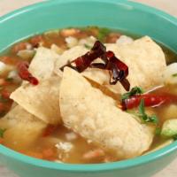 Tortilla Soup · Gluten-free. Spicy chicken broth served with chicken, avocado, queso fresco, fire roasted co...