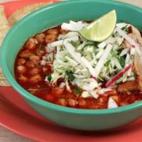 Pozole Rojo · Gluten-free. A pork stew with white hominy, garlic, guajillo chiles, and onions topped with ...