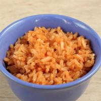 Kids' Mexican Rice & Beans · A small side of Mexican rice and your choice of beans.