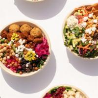 Build Your Own Bowl · Mediterranean spiced couscous and or organic warm chickpeas, with your choice of greens, org...