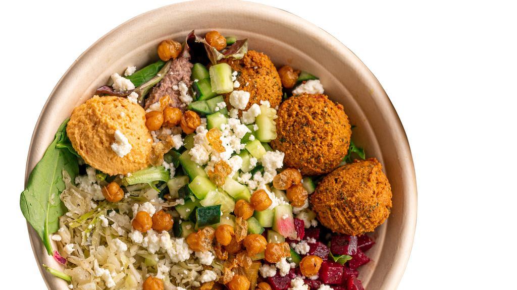Kale Protein Bowl · Protein packed salad bowl with Garbanzo Beans, Spinach, Mixed Greens, Traditional Hummus, Tzatziki, Kale Salad, Beets, Olives, Pita Chip Croutons