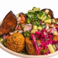 Spicy Plant Power Bowl · This fiery plant packed power bowl made with warm Garbanzo Beans, Olives, Traditional Hummus...