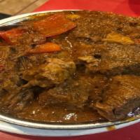Beef Mechado · Beef stew, bell pepper, potatoes in tomato sauce.