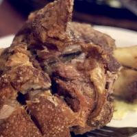 Crispy Pata Alajillo · Fried pork legs in garlic sauce.