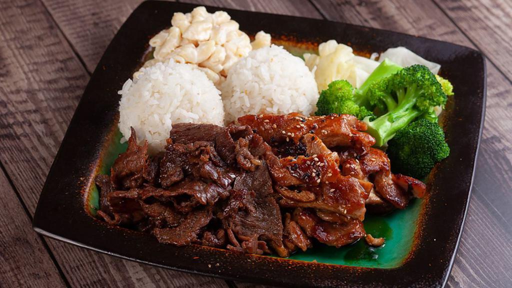BBQ Chicken and Beef · Grilled Slices of Beef served with 2 scoops steamed rice, 1 scoop macaroni salad and vegetables. No substitutions.