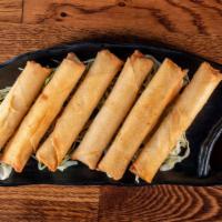 Lumpia (6 Pc) · Egg rolls filled with pork and veggies. Comes with a side of sweet and sour sauce.