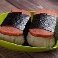 Spam Musubi (2pcs) · Slices of Spam with rice and sauce in between wrapped with seaweed.