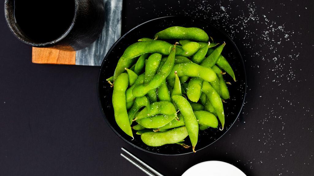 Edamame · Al dente boiled soy beans and salted.