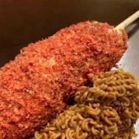 Hot Cheetos Sausage · A korean rice flour hot dog with beef sausage  topped with hot cheetos
