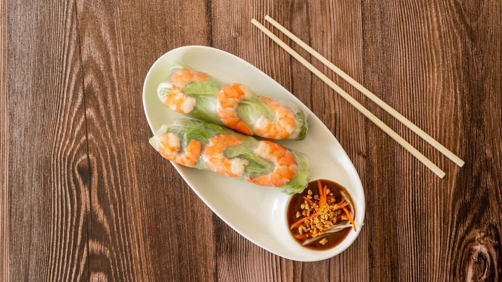 Goi Cuon Roll · Two rolls of steamed shrimp wrapped in rice paper, lettuce, mint, bean sprouts, and rice noodles. Served with peanut sauce.