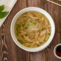 Pho Ga · Shredded chicken pho, served with a side of fresh basil and beansprouts.