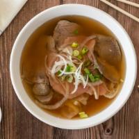 Pho Dac Biet · Combination of rare steak, well-done beef brisket, tendon, beef tripe, and meatballs. Served...