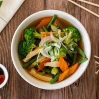 Pho Chay - Vegetables · Pho noodle soup with cooked mixed vegetable and tofu, served with a side of basil and beansp...