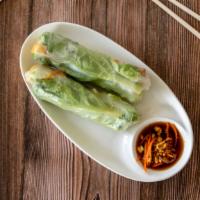 Vegetarian Rolls · Two rolls of sauteed tofu and mushroom wrapped in rice paper, lettuce, bean sprouts, and ric...
