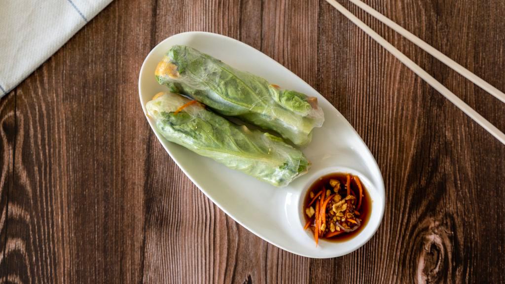 Vegetarian Rolls · Two rolls of sauteed tofu and mushroom wrapped in rice paper, lettuce, bean sprouts, and rice noodles. Served with peanut sauce.