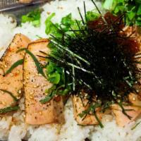 SALMON IKURA DON BENTO · Seared fresh raw salmon slices & salmon roes over rice with sweet miso sauce with vegetables...