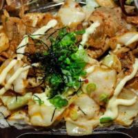 BUTA KIMUCHI DON BENTO · Stir fried pork slices & kimchi with mayo, green onion and dry seaweed served over rice. Com...