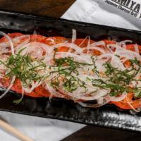 TOMATO CARPACCIO · Cold tomato slices with garlic bits, shiso leaves, onions & balsamic ponzu