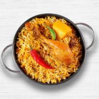 Chicken Biryani · Chicken cooked with rice, nuts, and spices.