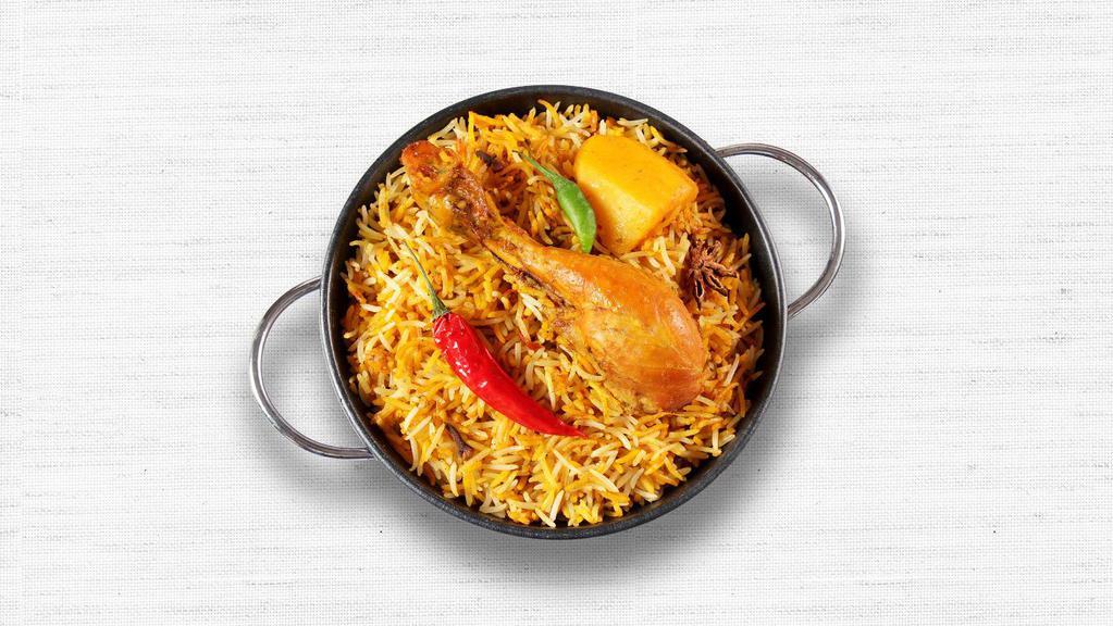 Chicken Biryani · Chicken cooked with rice, nuts, and spices.