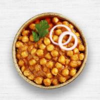Chana Masala · Chickpeas cooked with onions, tomatoes, and spices. Served with basmati rice.