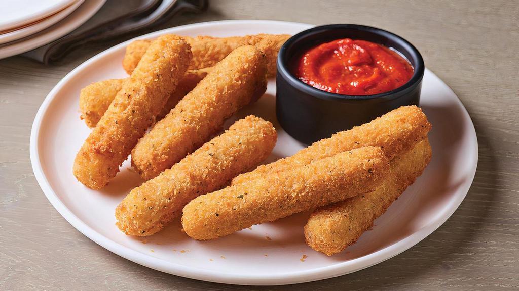 Mozzarella Sticks · Crispy outside with melty Mozzarella inside, this favorite is served with marinara sauce.