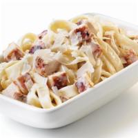 Kids Grilled Chicken Alfredo · Oodles of noodles covered with a creamy Alfredo sauce, then tossed with diced chicken and sp...