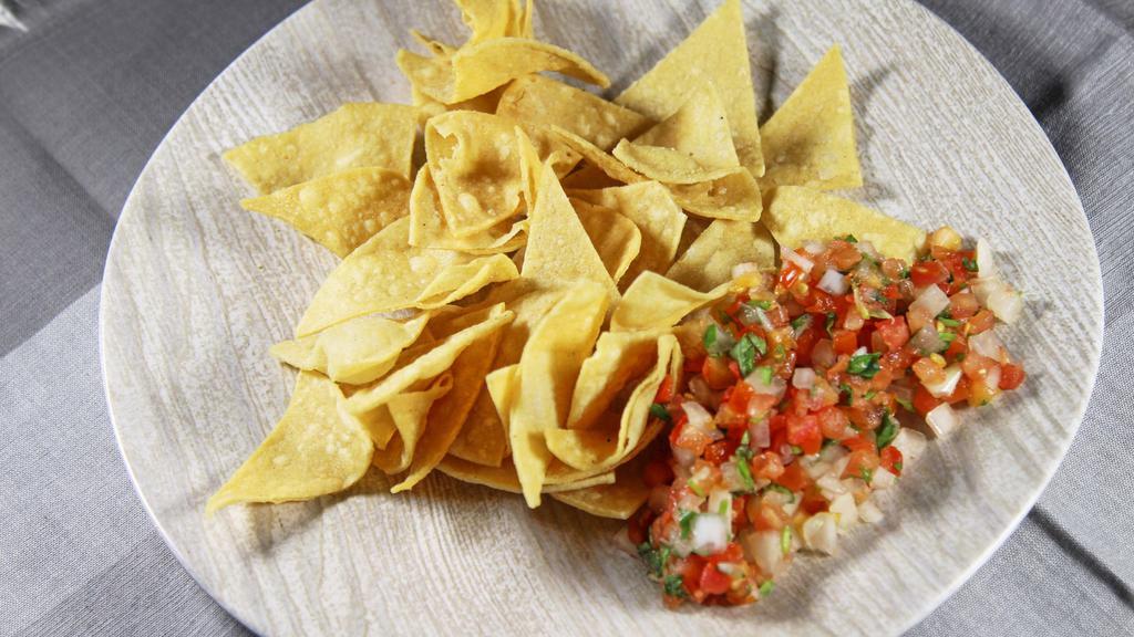Chips & Salsa · Made from our fresh corn tortillas.