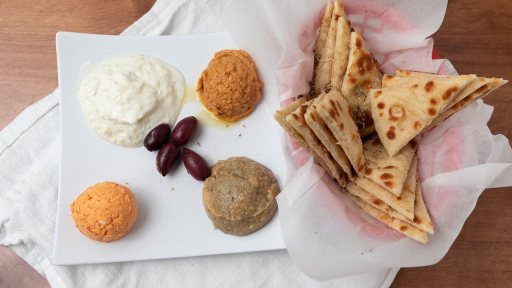 Appetizer Special · Hummus, tzatziki, melizanosalata, and spicy Feta, served with two pitas.