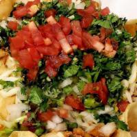 Veggie Taco Salad · Rice, Beans, Lettuce, Tomato, Onion, Cilantro, Cheese and Sour Cream.