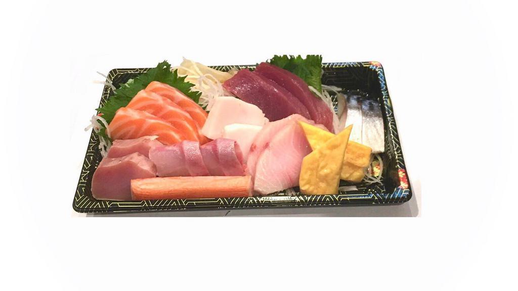 Chirashi · 18 assorted raw fish over seasoned rice. Served with miso soup.