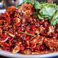 105. Hunan Chicken Bandit Style with Chili 辣椒炒鸡 · Spicy.