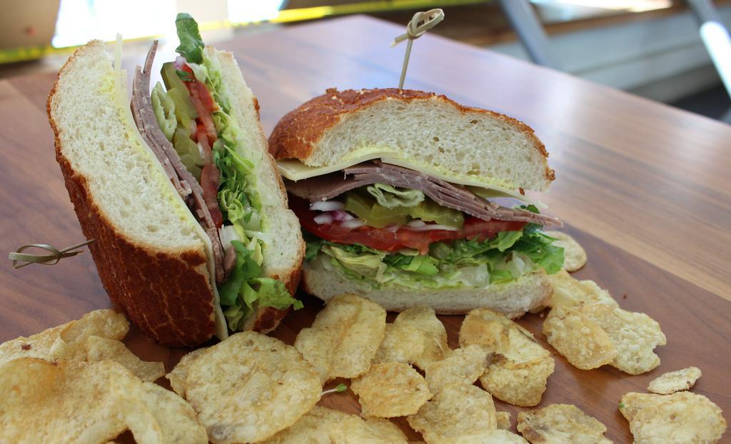 Roast Beef & Pepperoncini · Swiss cheese, pickle, onion, lettuce, tomato, and home made aioli.