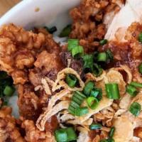 Fried Chicken Bowl · Chicken thigh fillet marinated in a garlic and ginger then dipped in rice flour and double f...