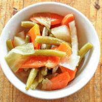 Pickles · Tum Style spicy vegetable pickles in palm vinegar & fish sauce