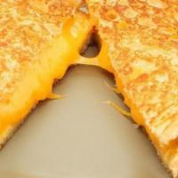 Grilled Cheese · Toasted egg bun with melted cheddar cheese.