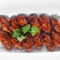 23. Spicy Chicken Wings (12 Pieces) · 