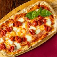 Margherita Pizza · Fresh mozzarella, tomato sauce and fresh basil.