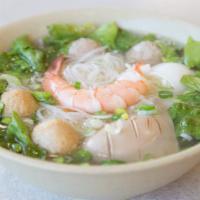 #34. Hủ Tiếu Nam Vang · Cambodian rice noodle soup. (comes w/ shrimp, beef ball, fried fish ball, squid, pork kidney)