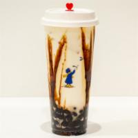 Brown Sugar Boba Latte · Fresh milk poured over premium-grade brown sugar! The drink comes with our boba!