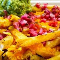 Ultimate Fries (Vegan) · Extra large serving of oven baked french fries, loaded with cheese, house-made guacamole, pi...