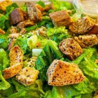 Caesar Salad (Vegan) · Romaine lettuce, parmesan and our house-made butter lemon-pepper croutons. Served with a zes...