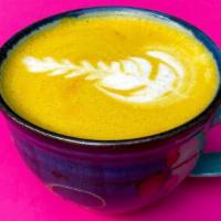 Golden Turmeric Latte w/ Ayurvedic Spices & MCT Oil · A double-shot of espresso poured over a blend of turmeric, ayurvedic spices and MCT Oil to p...